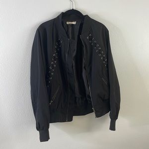 black bomber jacket with tie detailing